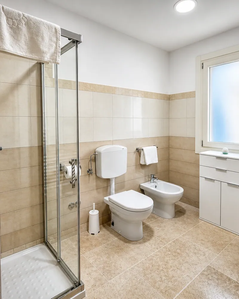 Full bathroom with shower, toilet and bidet (1 of 3)
