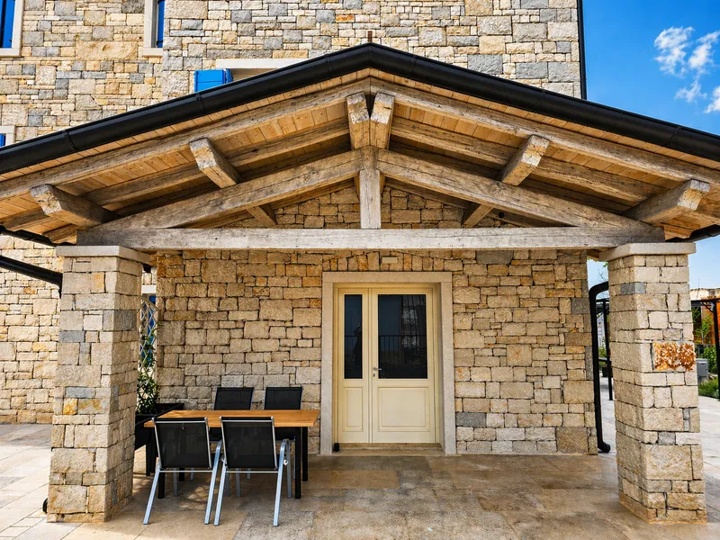 Covered stone terrace at Sandi Suite